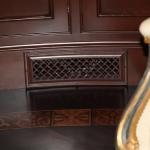 ribbon resin vent cover stained in wood on wll